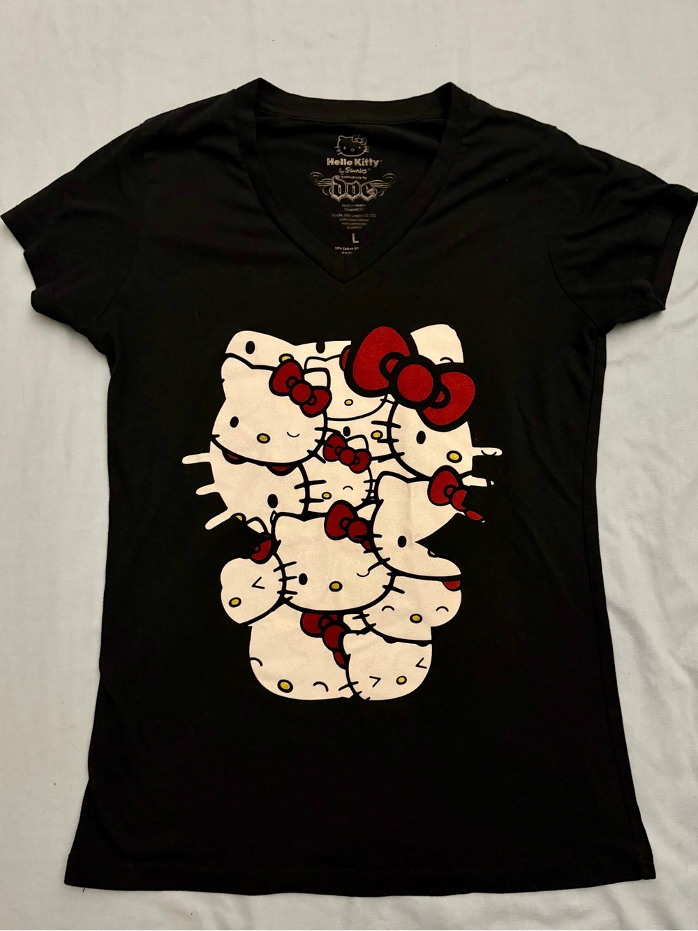 Hello Kitty Graphic Fitted Short Sleeve Black T-shirt.
Junior’s Size Large